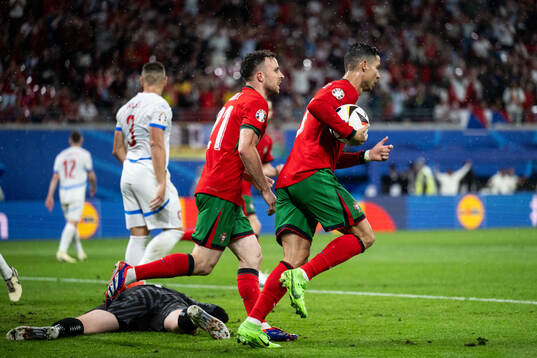 Diogo Jota and Cristiano Ronaldo of Portugal celebrate
