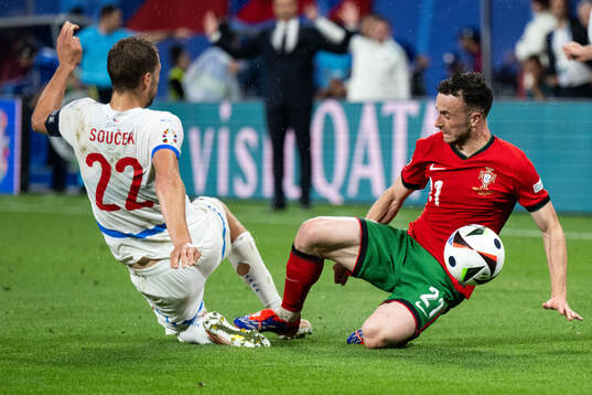 Tomas Soucek of Czech Republic and Diogo Jota  of Portugal
