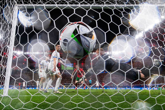 Robin Hranac and goalkeeper Jindfich Stanek of Czech