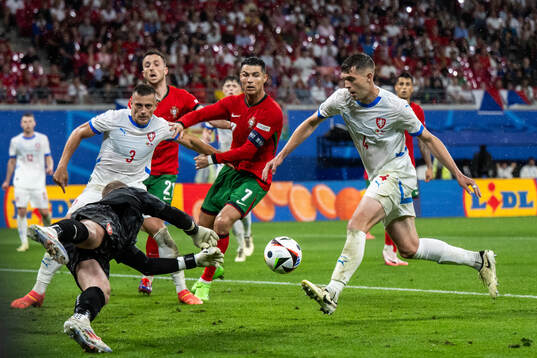 Robin Hranac of Czech Republic scores an own goal to 1-1