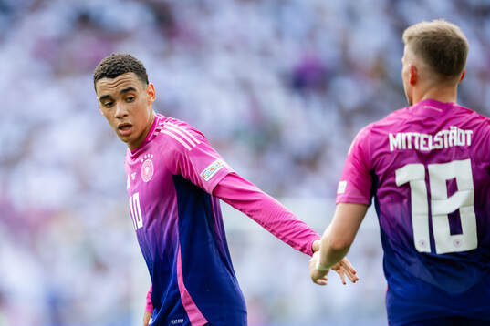Jamal Musiala and Maximilian Mittelstädt of Germany