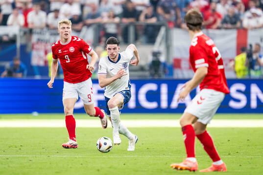 Rasmus Højlund of Denmark and Declan Rice of England