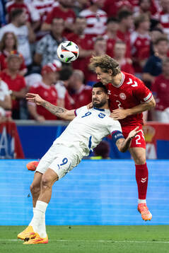 Aleksandar Mitrovic of Serbia and Joachim Christian Andersen of Denmark