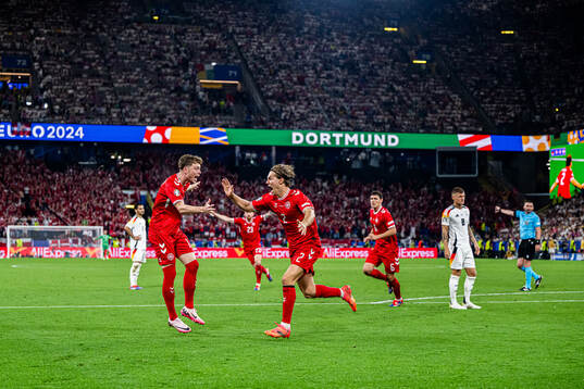 Andreas Skov Olsen and Joachim Andersen of Denmark celebrates