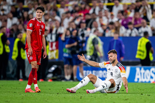 Christian Nørgaard of Denmark and Niclas Fullkrug of Germany