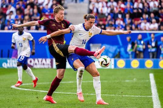 Kevin De Bruyne of Belgium and Adrien Rabiot of France