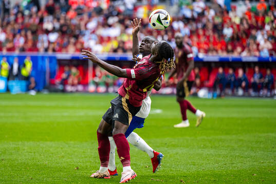 N'Golo Kanté of France and Jeremy Doku of Belgium
