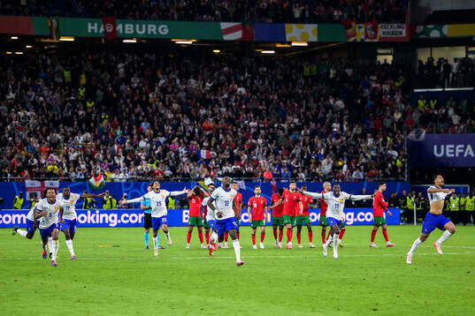 Jules Koundé, Bradley Barcola, Marcus Thuram, and Ousmane Dembele of France celebrate