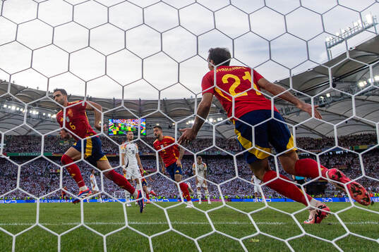 Mikel Merino of Spain celebrates after scoring 2-1