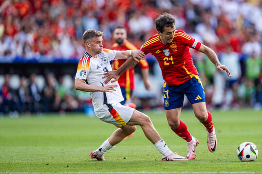 Joshua Kimmich of Germany and Mikel Oyarzabal of Spain