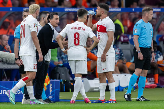 Head coach Vincenzo Montella, Baris Alper Yilmaz, Arda Guler and Salih Özcan of Turkey during the UEFA Euro 2024 Football Championship quarterfinal between Netherlands and Turkey on July 6, 2024 in Berlin. 
