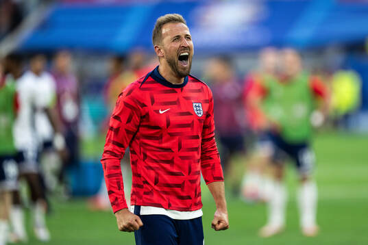 Harry Kane of England celebrates