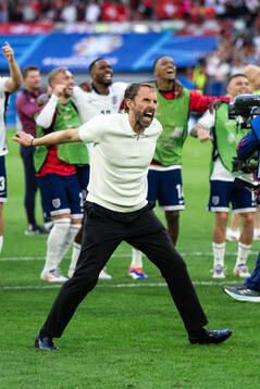 Head coach Gareth Southgate of England celebrates