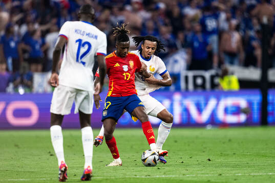 Nicholas Williams of Spain and Jules Koundé of France