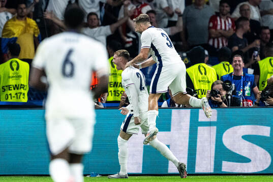 Cole Palmer and Luke Shaw of England celebrate after 1-1
