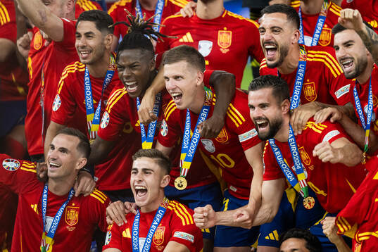 Nico Williams and Dani Olmo of Spain celebrate with their
