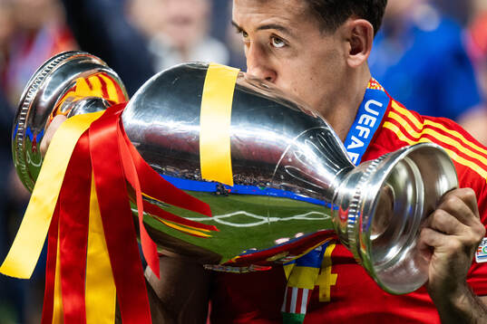 Mikel Oyarzabal of Spain celebrates with the trophy