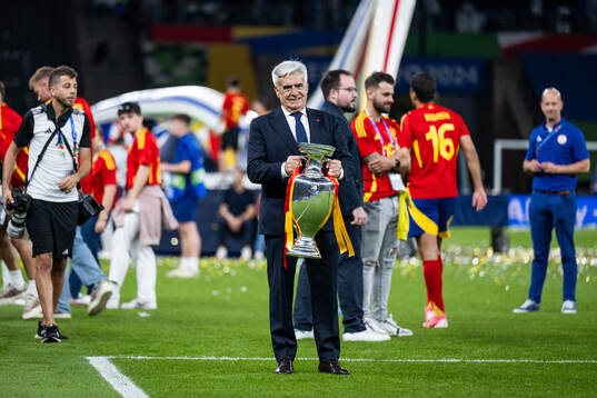 Pedro Rocha, President of the Spanish Football Federation, celebrates with the trophy