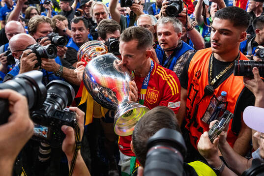 Fabian Ruiz Pena of Spain celebrates with the trophy
