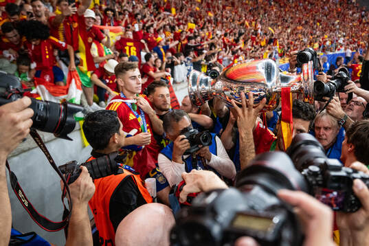 Rodrigo Hernandez of Spain celebrates with the trophy