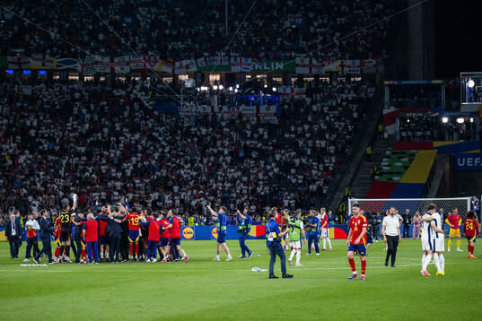 Players of Spain celebrate