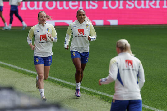 Kosovare Asllani  and Madelen Janogy of the Swedish women's national football team at a training session