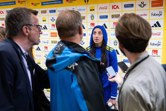 Rusul Rosa Kafaji of Sweden in mixed zone