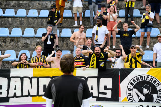 Fans of Häcken celebrate with Simon Sandberg