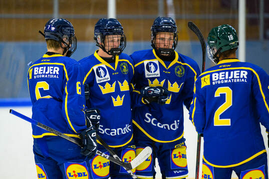 Oscar Holmertz of Sweden celebrates with teammates