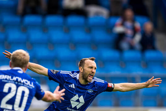 Magnus Wolff Eikrem of Molde celebrates