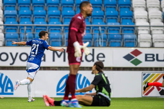 Martin Linnes of Molde celebrates after scoring the 3-0 goal