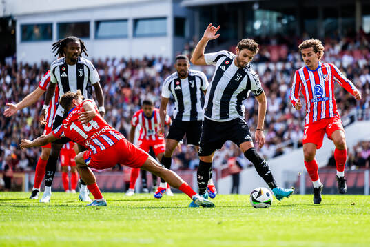 Marcos Llorente and Antoine Griezmann of Atletico Madrid