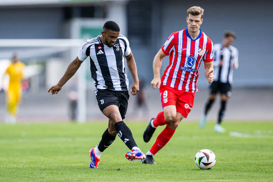 Douglas Luiz Soares De Paulo of Juventus and Alexander Sørloth of Atletico Madrid