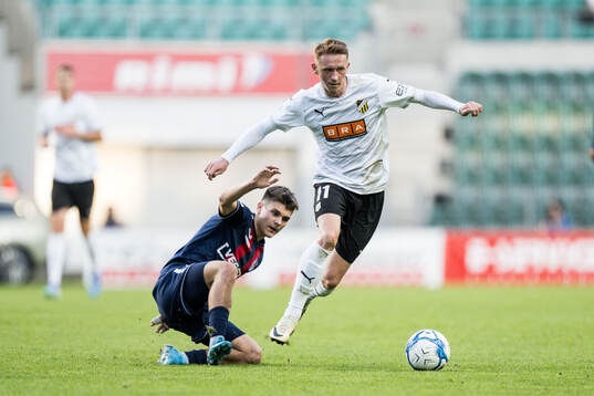 Patrik Kristal of Paide Linnameeskond and Julius Lindberg