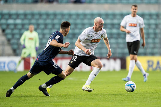 Siim Luts of Paide Linnameeskond and Valgeir Fridriksson of