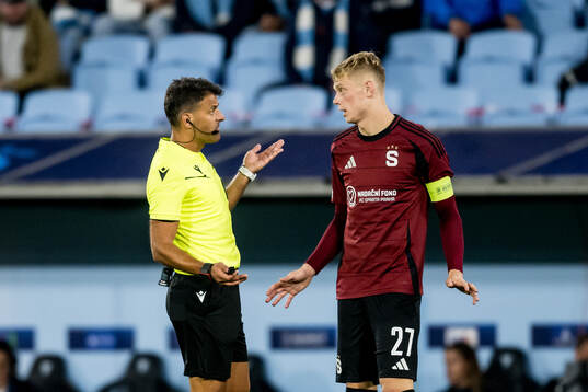 Referee Jesús Gil Manzano and Filip Panak of Sparta Prag