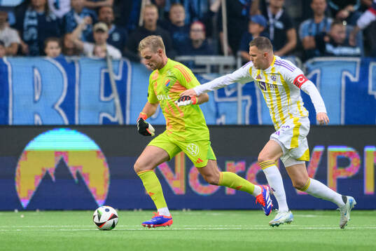 Goalkeeper Jacob Rinne of Djurgården and Josip Ilicic of
