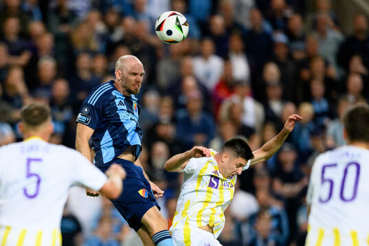 Marcus Danielson of Djurgården and Marko Božic of Maribor