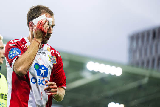 Julius Friberg Skaug of Lyn with an injury