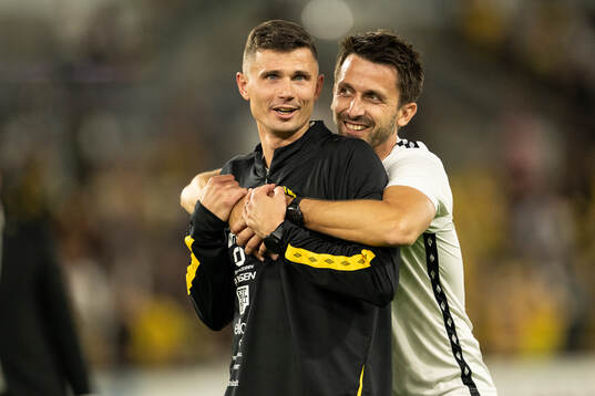 Assistant coach Fredrik Ahlstrand and Assistant coach Javier Agenjo Duran of Elfsborg celebrate