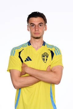 Noah Eile poses for at portrait