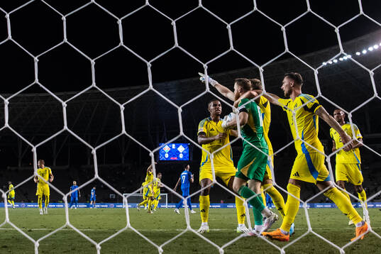 Isak Hien, Mattias Svanberg and Linus Wahlqvist Egnell celebrate with goalkeeper Viktor Johansson of Sweden after a saved penalty kick