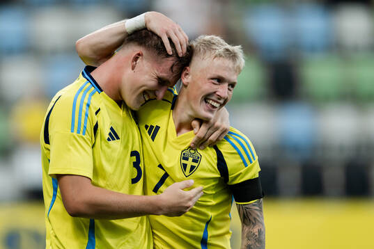 Casper Widell and Melker Widell of Sweden celebrate the 6-0
