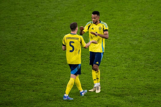 Gabriel Gudmundsson and Alex Douglas of Sweden celebrate