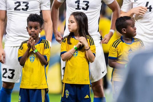 Mascots in front of players of Estonia ahead of the Nations League football match between Sweden and Estonia on September 8, 2024 in Stockholm. 
