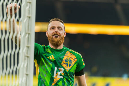 Goalkeeper Viktor Johansson of Sweden celebrates
