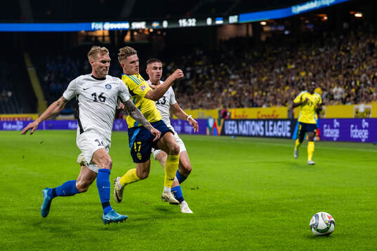 Viktor Gyökeres of Sweden competes for the ball with