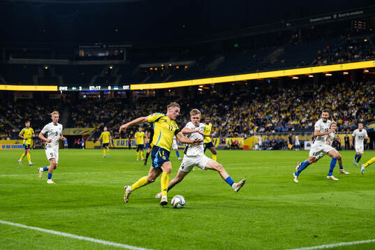 Viktor Gyökeres of Sweden and Michael Schjønning-Larsen