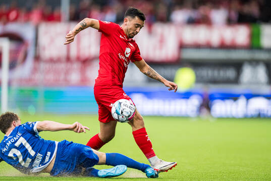 Jakob Maslø Dunsby of Sandefjord and Niklas Fernando Castro of Brann