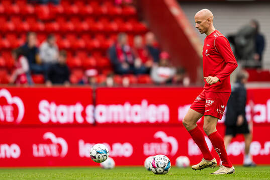 Ruben Kristiansen of Brann warms up ahead of the Eliteserien match between Brann and Bodø/Glimt on September 22, 2024 in Bergen. 